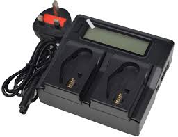 download Dual-slot battery charger with power cord and plug, designed to charge rechargeable batteries (AA/AAA).